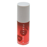 Fenty Skin Fenty Treatz lip oil bottle front view for instant hydration.