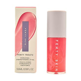 Fenty Skin Fenty Treatz Lip Oil Dragon Fruit bottle glows with hydrating shine.