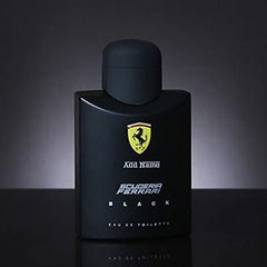 Ferrari Scuderia Black fragrance application on skin suggests lasting aroma experience.