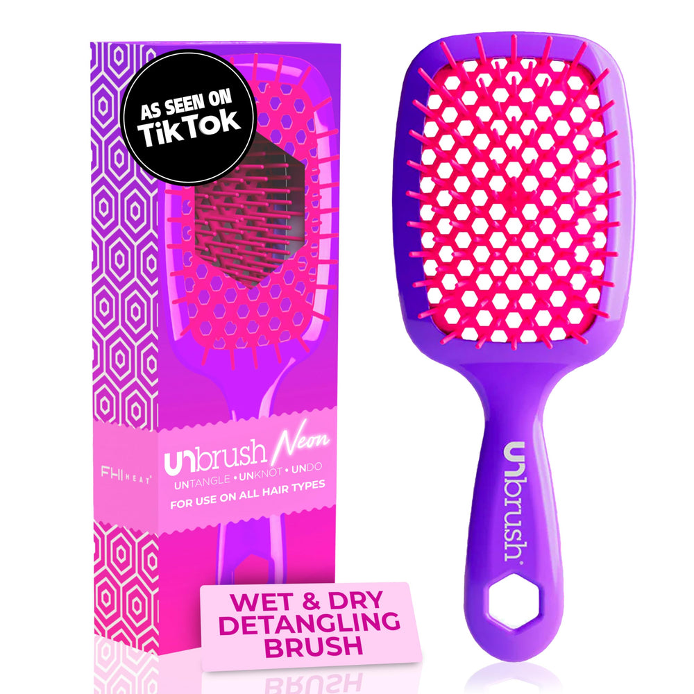 FHI Heat UNbrush detangling brush close-up on wet hair for gentle detangling