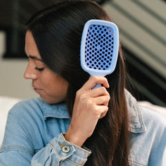 FHI Heat UNbrush on wet-dry hair showing universal detangling for all hair types.