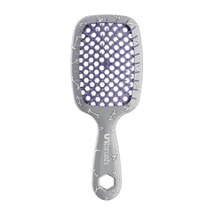 FHI Heat UNbrush Zero in action detangling hair smoothly