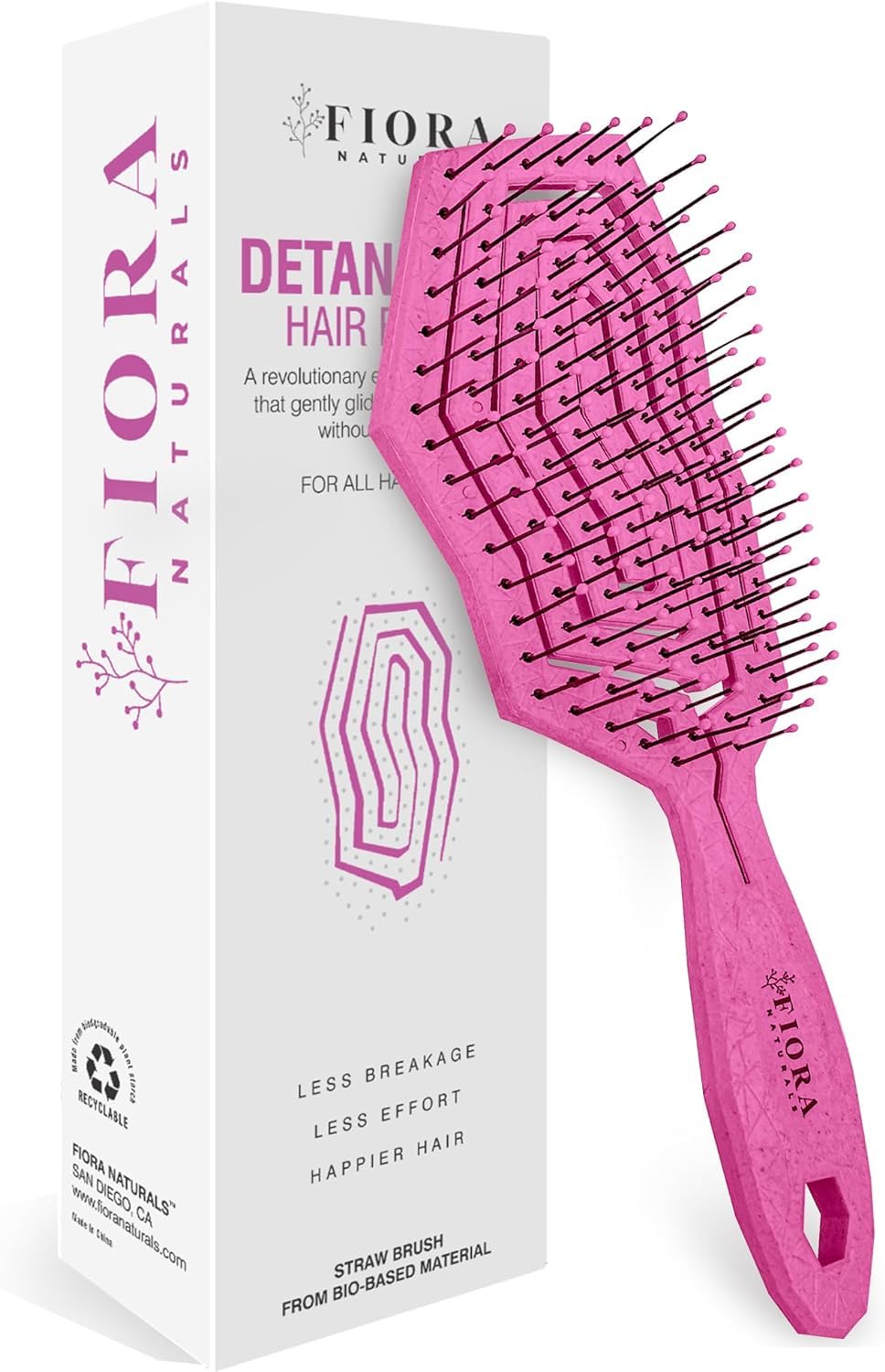 Fiora Naturals detangling brush with ultra-soft bristles gliding through knots.