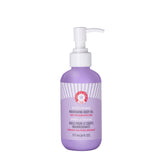 First Aid Beauty after-shower nourishing body oil bottle showing quick absorption for silky skin
