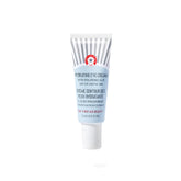 First Aid Beauty Hydrating Eye Cream tube close-up showing creamy texture for gentle nourishing application