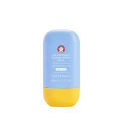 First Aid Beauty Hydrating Sunscreen Milk SPF 45 texture close-up, serum-like and non greasy protection.