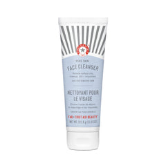 First Aid Beauty Pure Skin Face Cleanser bottle closeup for gentle makeup removal