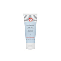 First Aid Beauty Ultra Repair Cream jar closeup demonstrates whipped texture for lasting hydration.