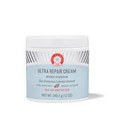 First Aid Beauty Ultra Repair Cream packaging front with grapefruit scent emphasis for hydration