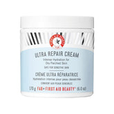 First Aid Beauty Ultra Repair Cream tub close-up highlighting rich formula for immediate hydration.