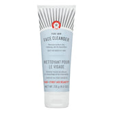 First Aid Beauty Pure Skin Cleanser bottle demonstrates fragrance-free makeup removal for sensitive skin.