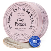 Firsthand Supply Hair Clay Pomade bottle closeup shows non-greasy, water-based hold