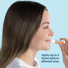 FixMySkin lip balm applied to lips for soothing relief from dryness.