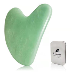 Flagest Gua Sha facial tool in jade heart shape for facial contour and spa-like glow.