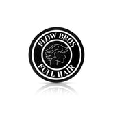 Flow Bros hair clay bottle shows nourishing formula for healthy-looking hair.