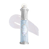 flower knows shell jewel nourishing lip glaze bottle close-up shows pearl shimmer and hydration.