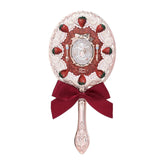Flower Knows strawberry Cupid motif mirror for daily makeup touch-ups and charming display.