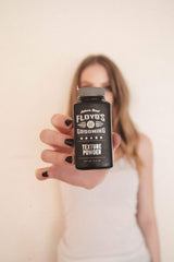 Floyd's 99 Hair Styling Powder absorbing oil on hair surface