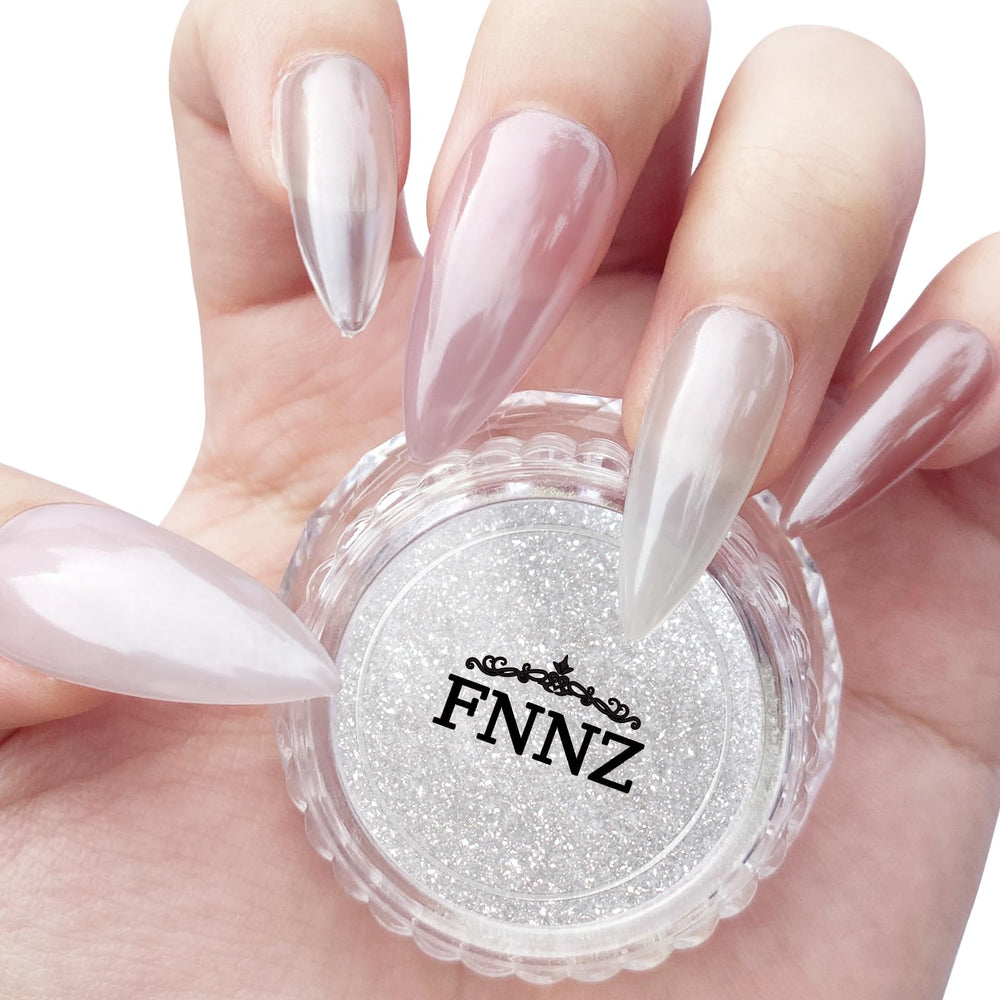 FNNZ white chrome nail powder jar closeup showing iridescent shimmer for salon-quality nails