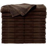 ForPro Premium Bleach-Tough Salon Towels in Chocolate, stacked for quick grab in busy spa settings.