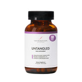 Foundation Skincare UnTangled Hair Vitamins bottle closeup highlights a daily supplement for fuller, shinier hair