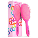 FRAMAR detangling brush pink-handle closeup for gentle detangling on wet or dry hair.