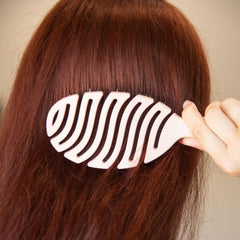FRAMAR flex brush bristles closeup demonstrates gentle detangling and smooth hair