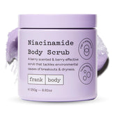 frank body niacinamide body scrub bottle berry scent delivers refreshing exfoliation for brighter skin.