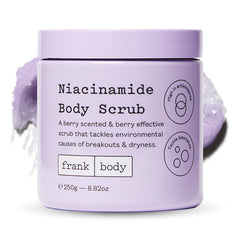 frank body niacinamide body scrub bottle berry scent delivers refreshing exfoliation for brighter skin.