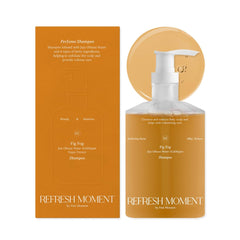 FREEMOMENT perfume shampoo bottle shows vegan formula for gentle cleansing and lasting fragrance.