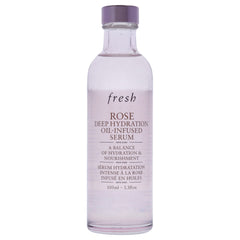 Fresh rosewater damask rose infused essence bottle highlighting calming hydration