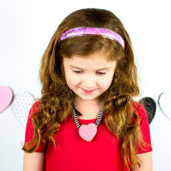 FROG SAC purple glitter headband with comb teeth supports active kids