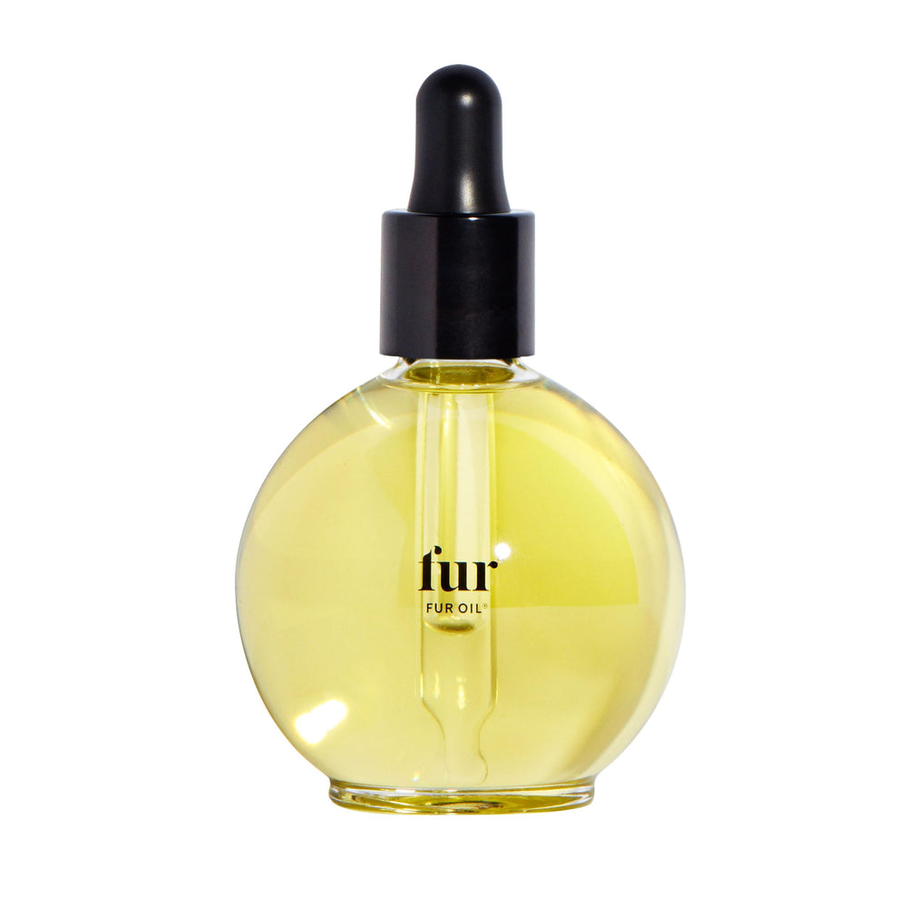 Fur Oil bottle pour demonstrates easy application for smooth, non-greasy skin and hair.