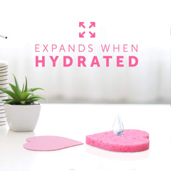 Fushay compressed facial sponge when wet expands for full-face cleansing and gentle exfoliation.