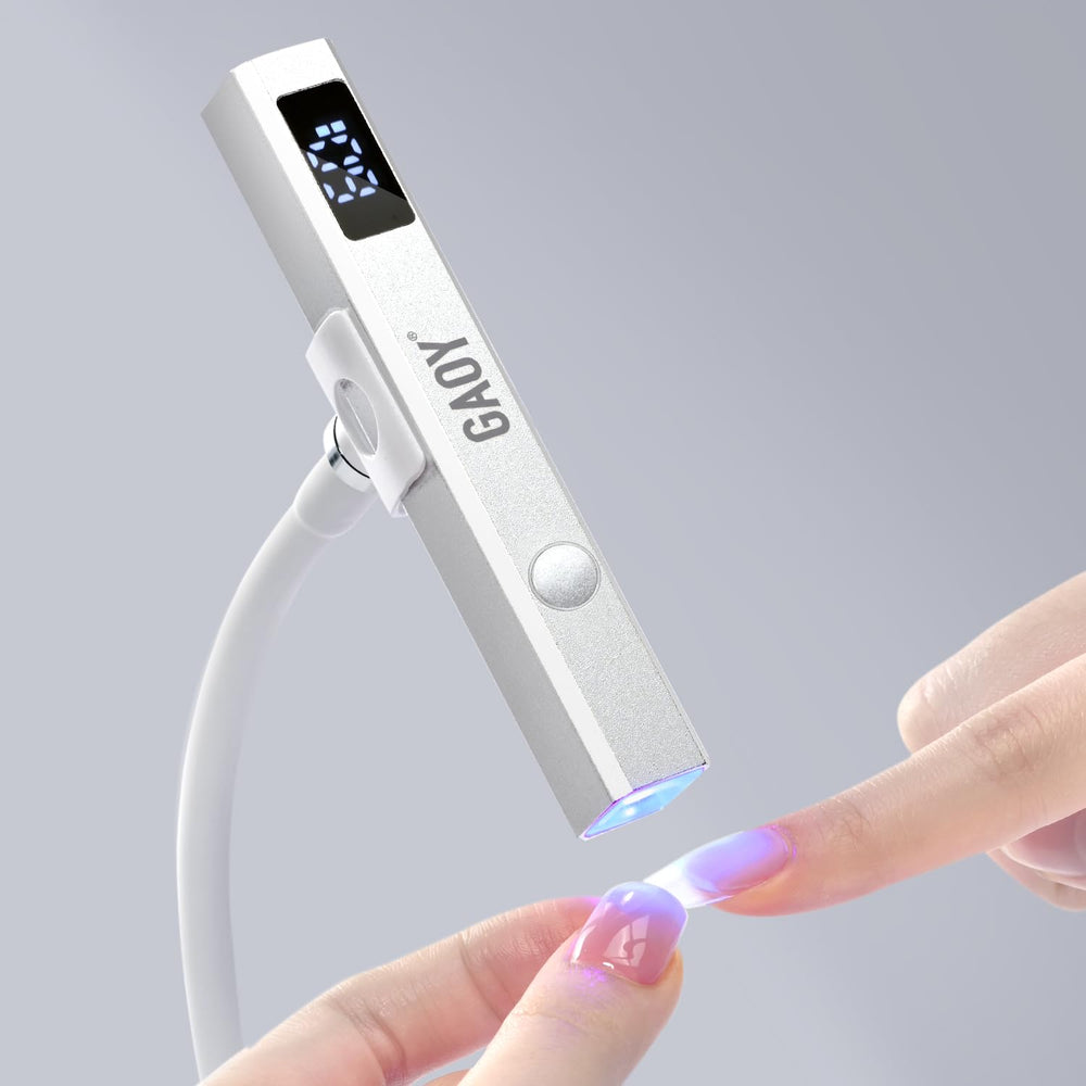 GAOY cordless nail lamp with stand in silver for stable, hands-free gel curing.