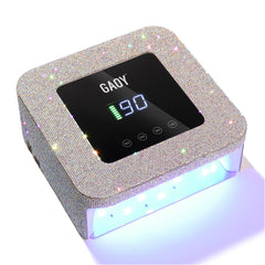 GAOY cordless UV LED nail lamp on desk ideal for quick at-home gel manicures.