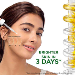 Garnier Bright Complete Vitamin C Booster serum dropper closeup for even-toned skin