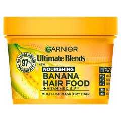 Garnier Hair Food Banana 3-in-1 bottle being poured for lightweight nourishment.