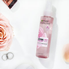 Garnier SkinActive rose water mist closeup with rose for calming skin.