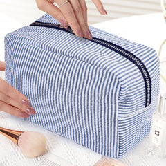GFU makeup bag pink opened demonstrates wide opening for quick access to cosmetics.