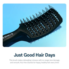 GIMME Beauty vented detangling brush ergonomic curved handle for comfortable brushing.