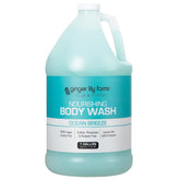 Ginger Lily Farms Club & Fitness body wash bottle pouring with silky post-workout lather.