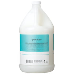 Ginger Lily Farms Club & Fitness Ocean Breeze scent image evokes a refreshing daily ritual for hair care.