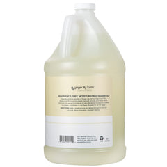 Ginger Lily Farms Club & Fitness shampoo pour showing fragrance-free formula.