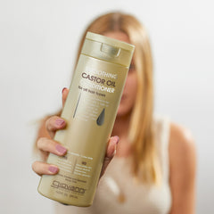 Giovanni smoothing castor oil conditioner pour demonstrates even coverage for nourishment