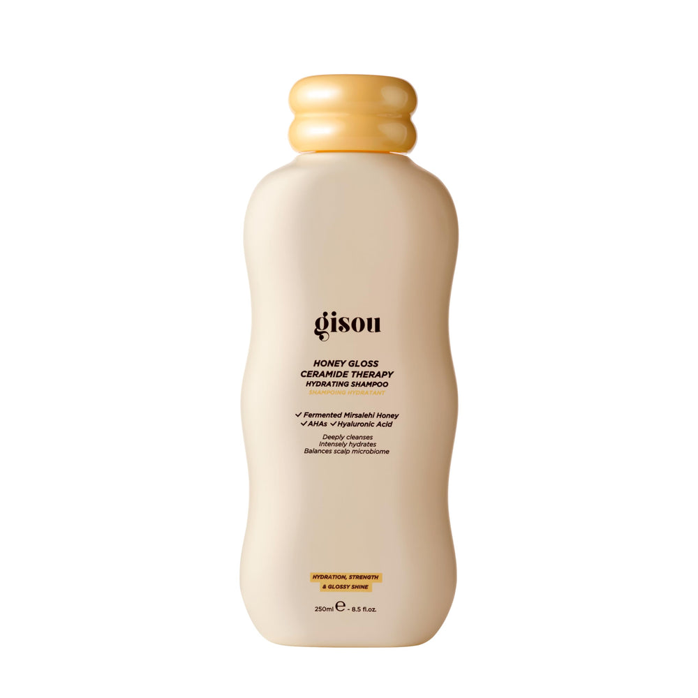Gisou Honey Gloss Ceramide Therapy Hydrating Shampoo bottle shows hydrating, color-safe formula.