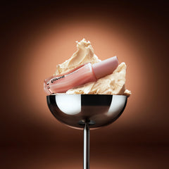 Gisou lip oil application close-up showing smooth glide and non-sticky finish.