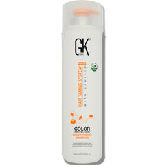 GK Hair sulfate-free moisturizing shampoo bottle promotes daily hydration and color protection.