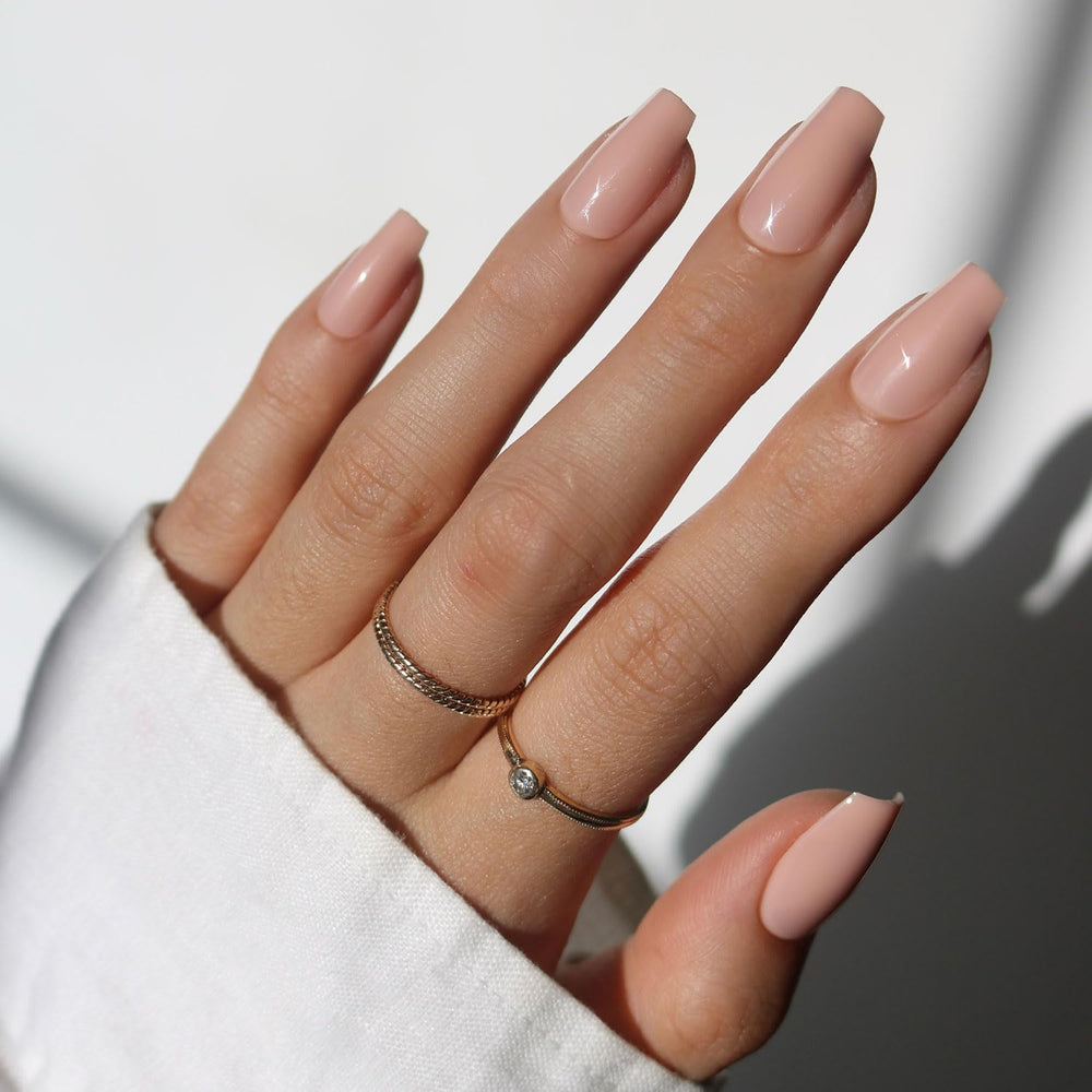 Glamnetic Exposed medium coffin nails kit ready for salon-style wear with durable shine.