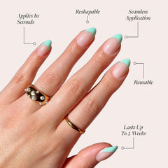 Glamnetic Pistachio Crème nails mint blue tips emphasizing fresh, chic spring look.